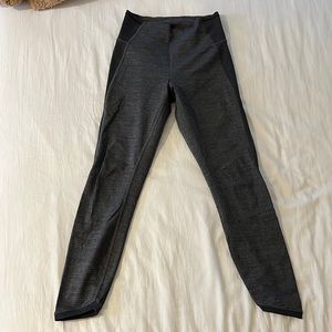 Heather gray Lululemon leggings with mesh detail